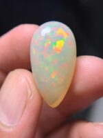 16.15 Carat Natural Ethiopian White Opal–A Masterpiece of Fire & Brilliance - Image 2