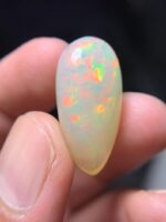 16.15 Carat Natural Ethiopian White Opal–A Masterpiece of Fire & Brilliance - Image 3