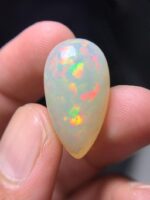 16.15 Carat Natural Ethiopian White Opal–A Masterpiece of Fire & Brilliance - Image 4