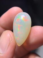 16.15 Carat Natural Ethiopian White Opal–A Masterpiece of Fire & Brilliance - Image 5