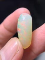 16.15 Carat Natural Ethiopian White Opal–A Masterpiece of Fire & Brilliance - Image 6