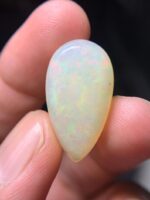 16.15 Carat Natural Ethiopian White Opal–A Masterpiece of Fire & Brilliance - Image 7