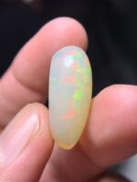 16.15 Carat Natural Ethiopian White Opal–A Masterpiece of Fire & Brilliance - Image 8