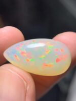 16.15 Carat Natural Ethiopian White Opal–A Masterpiece of Fire & Brilliance - Image 9