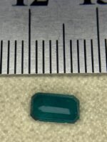 Exploring the Beauty of a 0.450ct Greenish-Blue Hauyne: Emerald Cut Masterpiece - Image 8