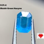 The Radiance of 0.31 ct Bluish Green Hauyne: Emerald Cut Gemstone