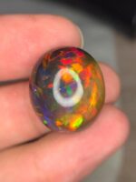 AIG Certified Full Fire 27.71 CT Black Ethiopian Opal - Image 2
