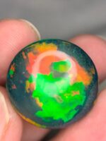AIG Certified Beautiful Fire 26.91 CT Black Ethiopian Opal from Ethiopia - Image 3