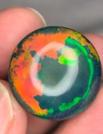AIG Certified Beautiful Fire 26.91 CT Black Ethiopian Opal from Ethiopia - Image 4