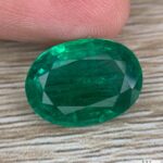 AIG Certified 9.10 ct Minor Oil Emerald from Zambia