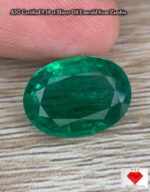 AIG Certified 9.10 ct Minor Oil Emerald from Zambia