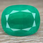 AIG Certified Minor Oil 12.59 CT Emerald from Zambia