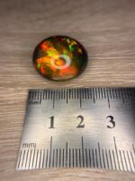 AIG Certified Full Fire 27.71 CT Black Ethiopian Opal - Image 5