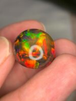 AIG Certified Full Fire 27.71 CT Black Ethiopian Opal - Image 3