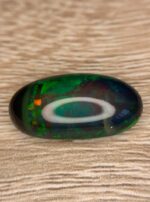 Beautiful 8.51 CT Black Ethiopian Opal Gemstone with Exceptional Presence - Image 3
