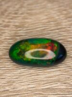 Beautiful 8.51 CT Black Ethiopian Opal Gemstone with Exceptional Presence - Image 5