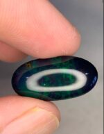 Beautiful 8.51 CT Black Ethiopian Opal Gemstone with Exceptional Presence - Image 6