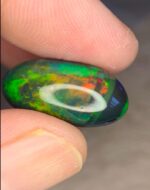 Beautiful 8.51 CT Black Ethiopian Opal Gemstone with Exceptional Presence - Image 8