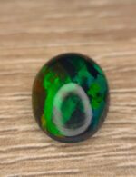 Full Fire 5.35 CT Black Ethiopian Opal Subtle Beauty with Refined Proportions - Image 4
