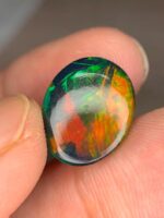 Full Fire 5.35 CT Black Ethiopian Opal Subtle Beauty with Refined Proportions - Image 5