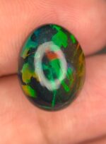 Full Fire 5.35 CT Black Ethiopian Opal Subtle Beauty with Refined Proportions - Image 9