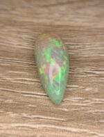 6.81 CT White Opal Cabochon – Sleek Elegance and Distinctive Charm - Image 3