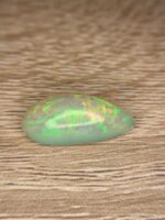 6.81 CT White Opal Cabochon – Sleek Elegance and Distinctive Charm - Image 4
