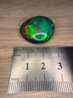 AIG Certified Honey Comb 24.45 CT Black Ethiopian Opal - Image 10